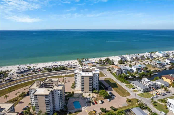 Drone / aerial view of waterfront with a beach