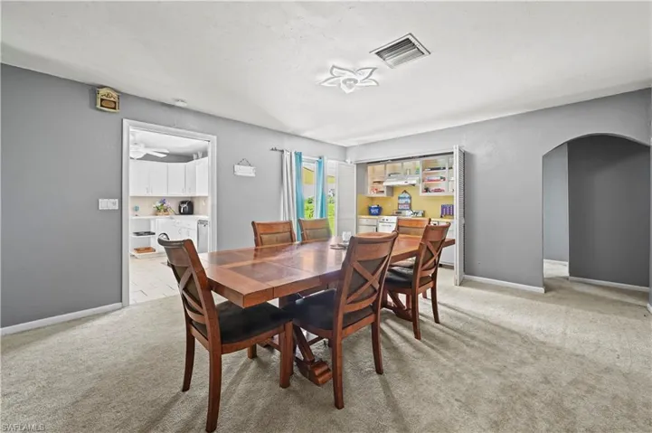 View of carpeted dining room