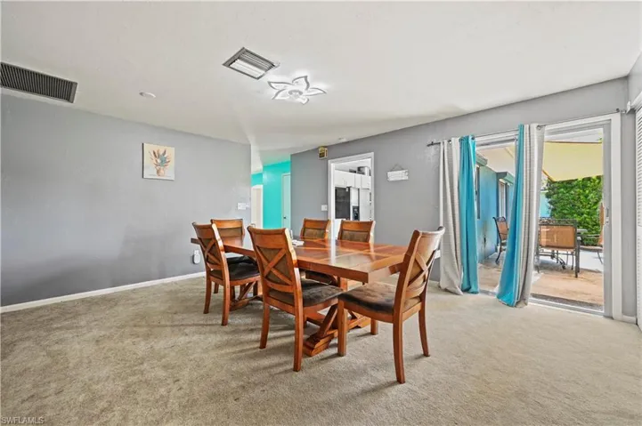 View of carpeted dining space