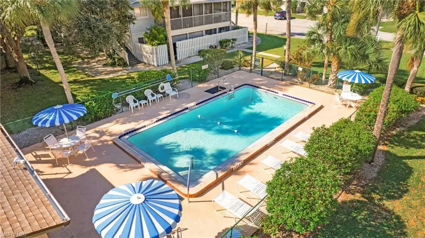 Community pool featuring a patio area