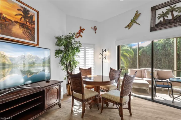 Dining space with light wood-type flooring and plenty of natural light