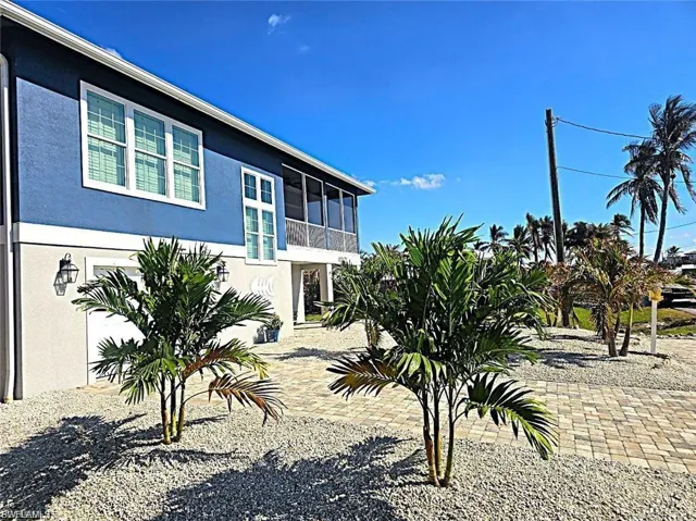 View of yard with a balcony