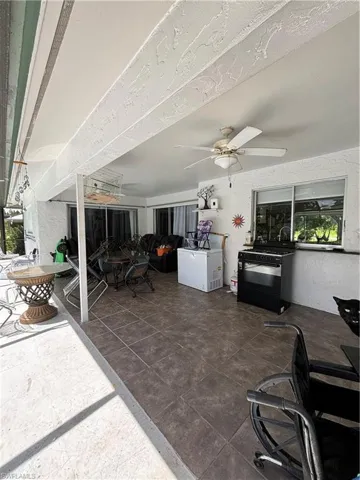 View of patio / terrace with a ceiling fan