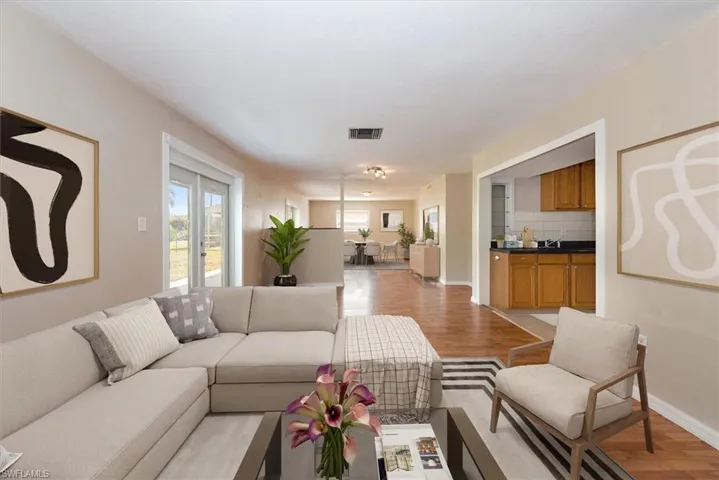 Family room/dining area virtually staged