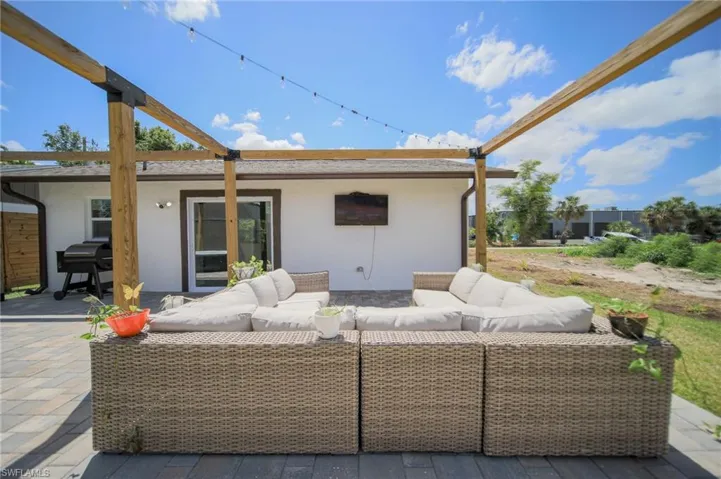 Outdoor lounge area and outdoor grill