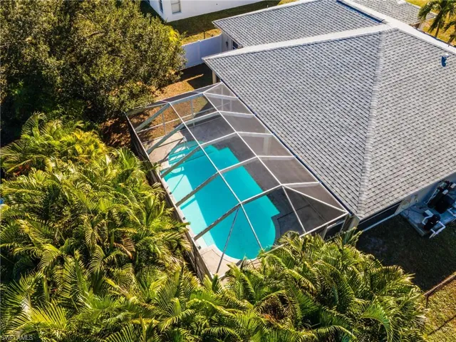 Private, fully fenced back yard for your tropical paradise.