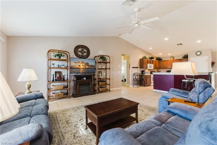 Living room with plenty of room for sectional couches - open to the kitchen which is great for entertaining!