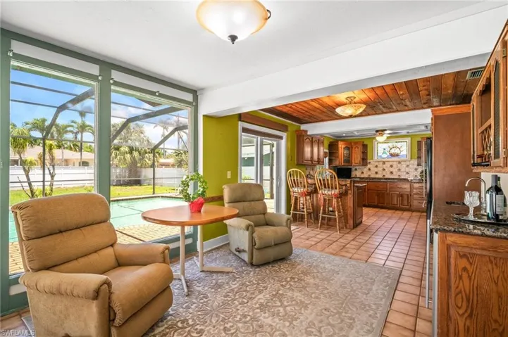 Living area featuring a sunroom