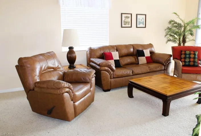 Living room featuring carpet floors