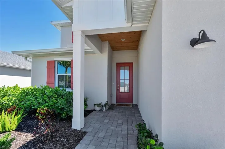 Expansive lakefront lot on Preservation Way with spacious 4,085+ sq ft of modern luxury living.
