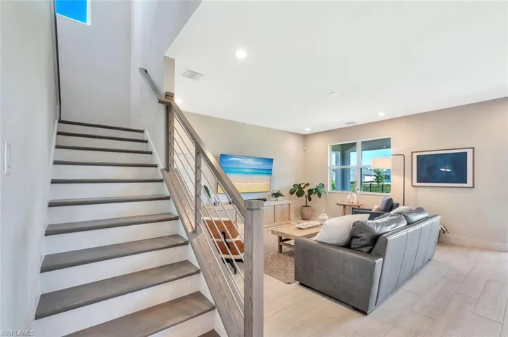 Private office/den on main level—ideal for remote work, study, or a quiet creative space.