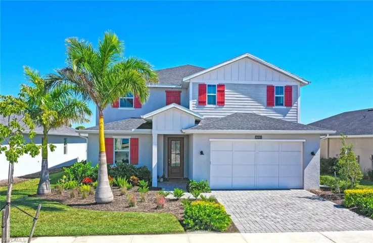 Expansive lakefront lot on Preservation Way with spacious 4,085+ sq ft of modern luxury living.