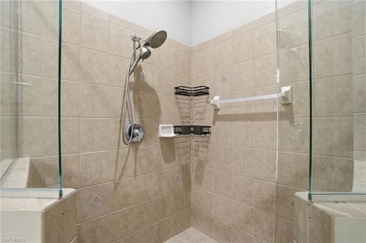 Full bathroom featuring a tile shower