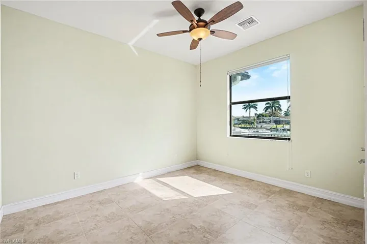 Guest bedroom with a view of the canal