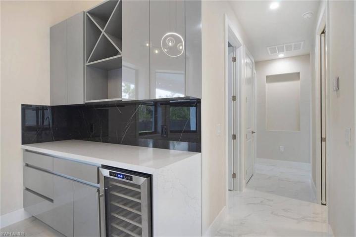 more beautiful cabinetry and wine fridge
