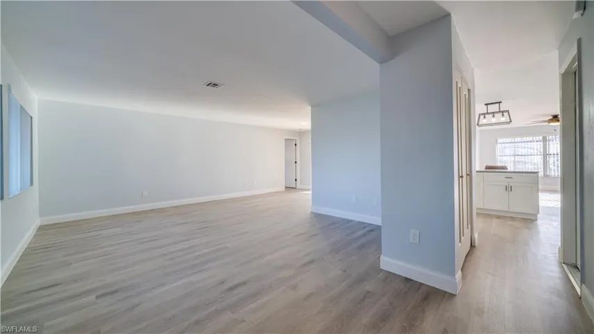 Empty room featuring hardwood / wood-style floors