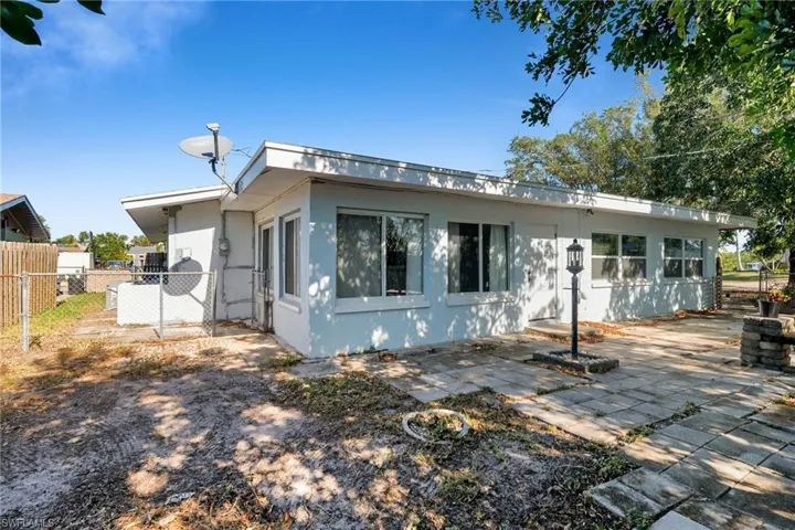 Rear view of house with a patio area