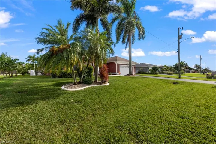 View of yard featuring a garage