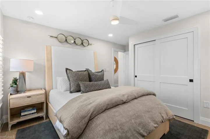 Guest bedroom #3 featuring designer furniture and deco.    (Photo digitally enhanced)