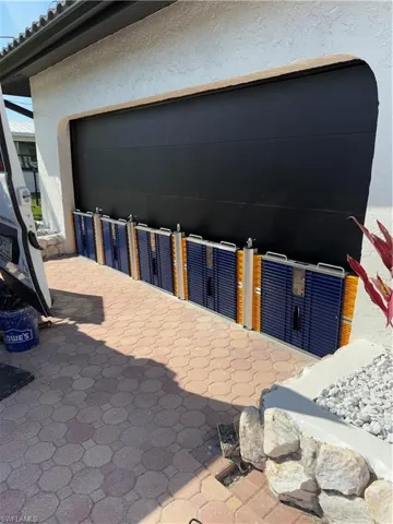 Dam Easy Expended to protect a two car garage width