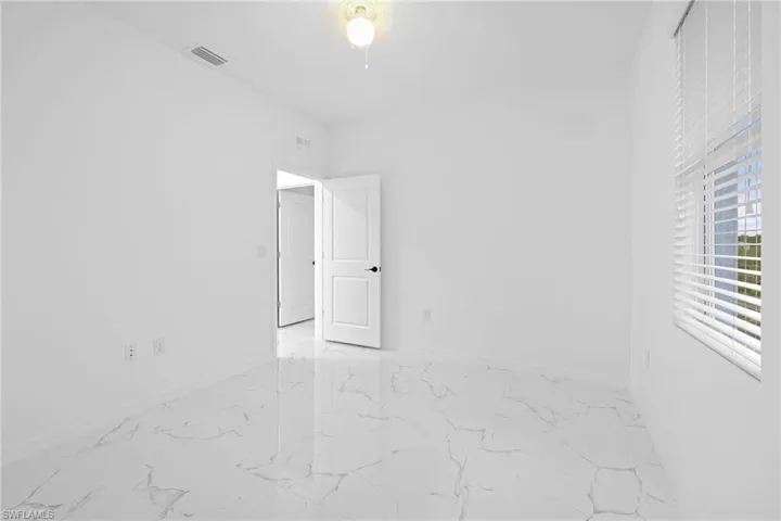 View of tiled spare room