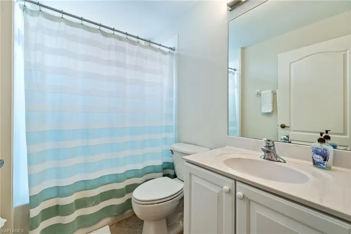 Guest bathroom with tub