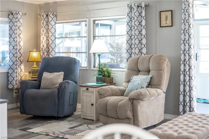 Sitting room with wood finished floors