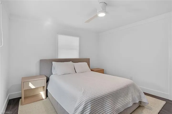 Bedroom with baseboards and ceiling fan