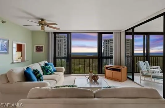 Living room featuring a wall of windows