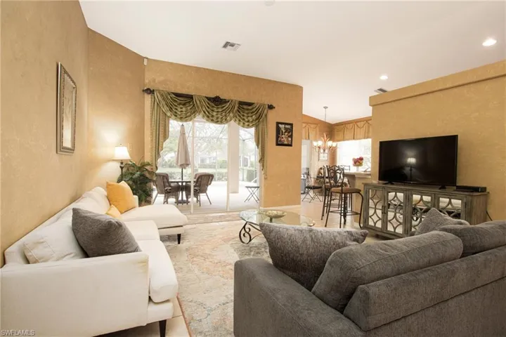 Living room with a notable chandelier