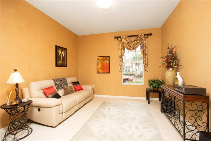 Living room featuring light tile patterned flooring
