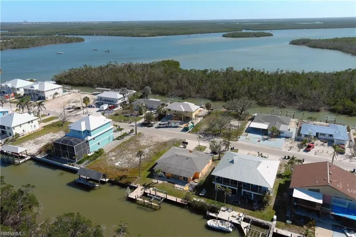 Aerial view of residential area with a nearby body of water
