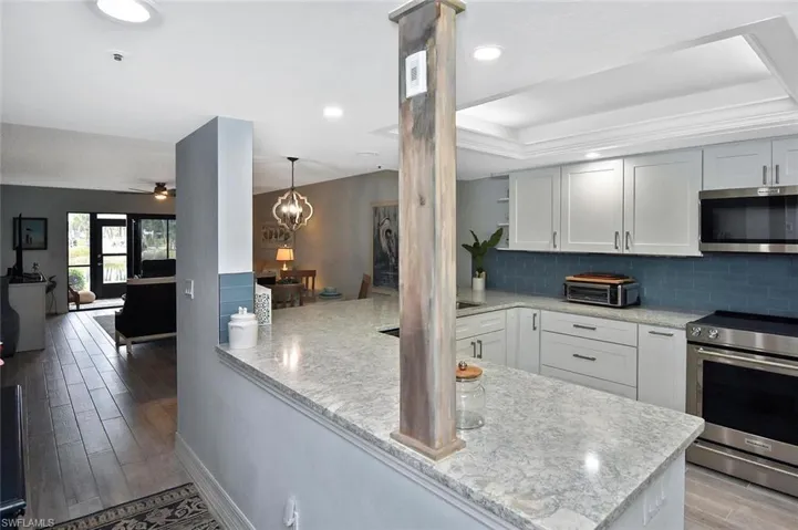 A beautiful stone countertop on this wrap-around island