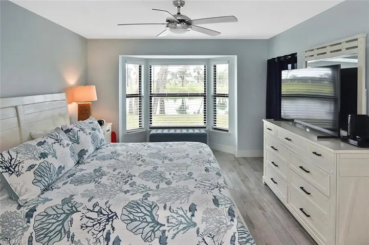View from the bathroom area.  Shown with a king bed.