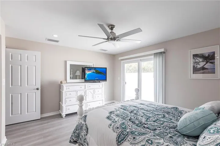 Master Suite with Sliding Glass Doors to the Patio Courtyard