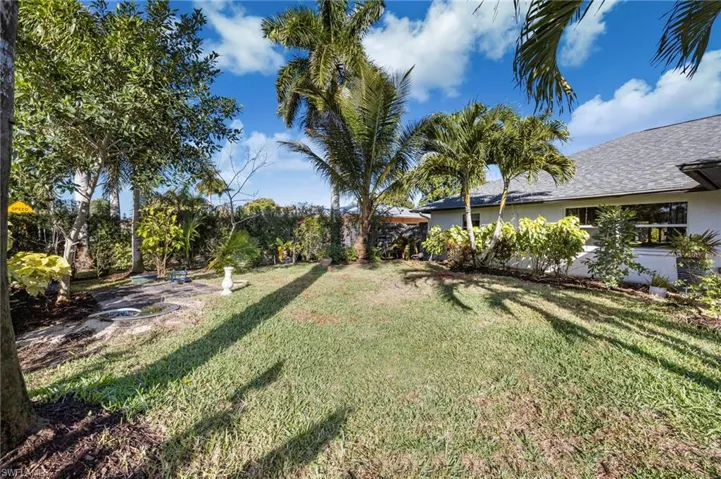 View of fenced backyard