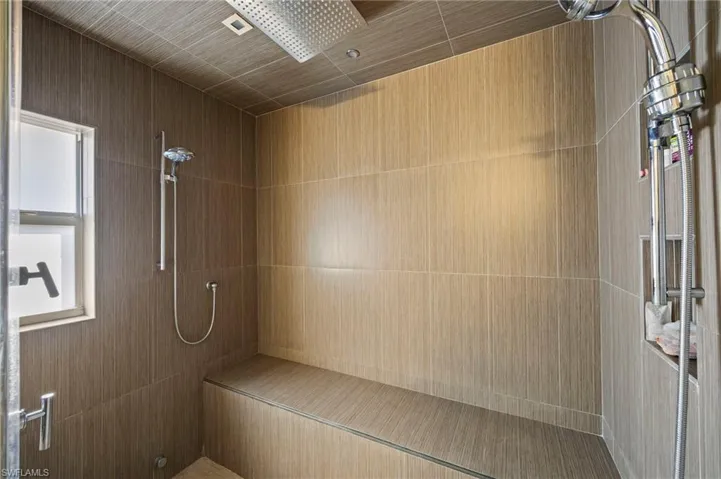 Full bath with tiled shower