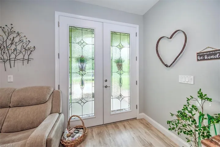Front Doorway to outside featuring french doors