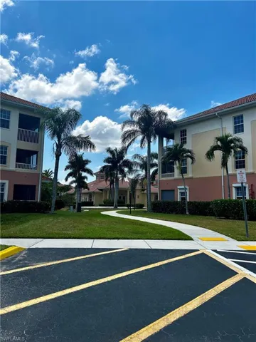 Walkway to the Club House. Bldg is on Left