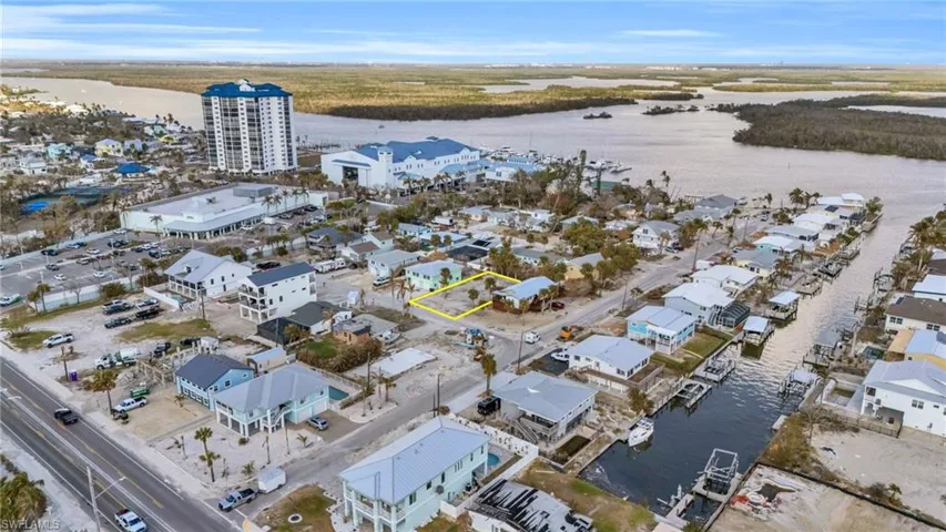Drone / aerial view featuring a water view VIRTUALLY EDITED