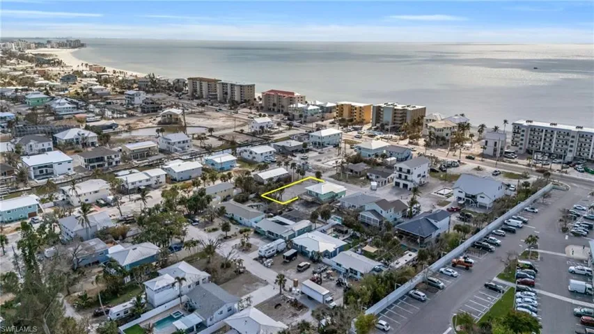 Birds eye view of property with a water view VIRTUALLY EDITED