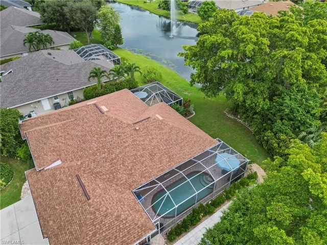 Two enclosed lanai areas with this home. Pool is on the side of the home .