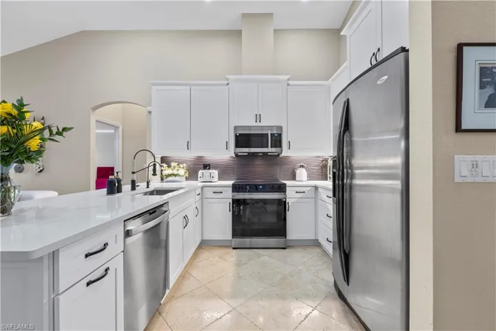 Brand new kitchen. Just renovated in Sept 2024 , white cabinetry with soft touch. Quartz countertops, travertine flooring, new dishwasher and stove top.