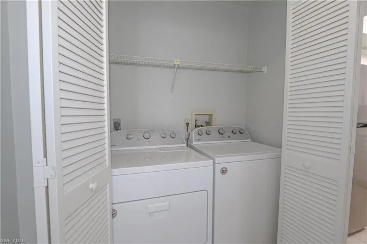 Laundry area with washer and dryer.