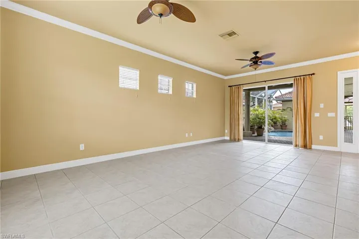 Grand Living Room overlooking the Lanai and Pool