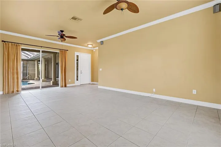 Living Room to Courtyard and Entry Foyer