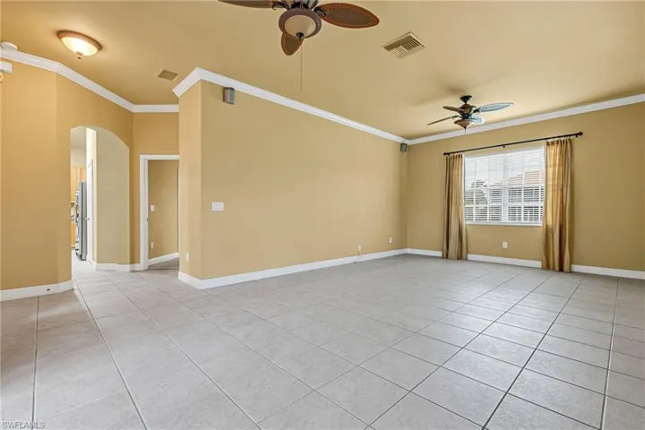 Living Area to Entry Foyer and Kitchen