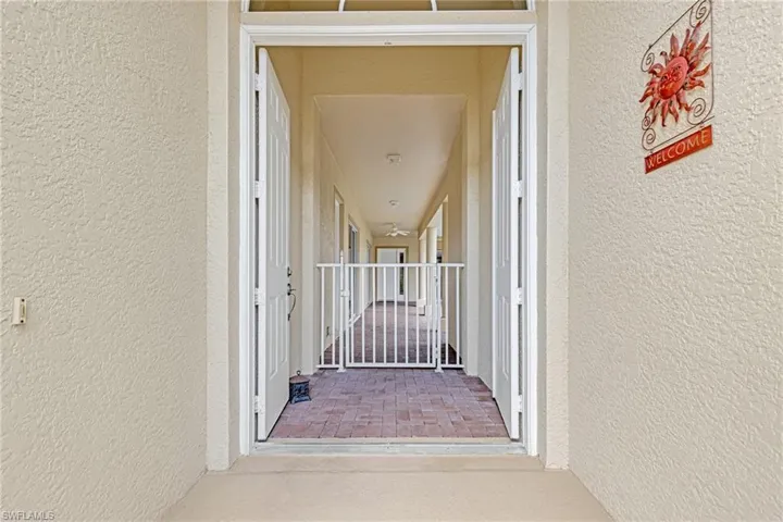 Courtyard Entry Double Doors Screened Foyer