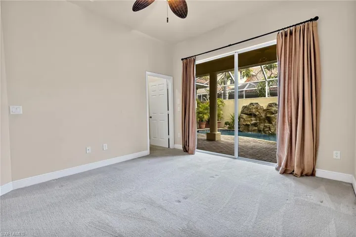 Guest Bedroom Sliders to Lanai/Pool and Walk in Closet