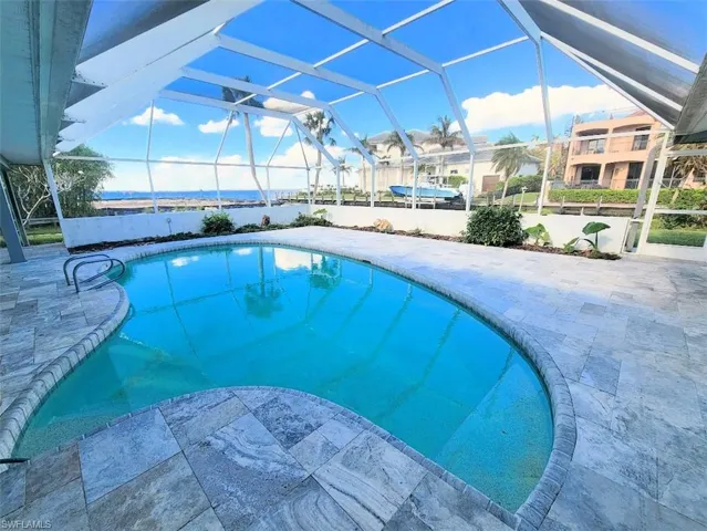 Pool w/Screened Cage facing River - View #1